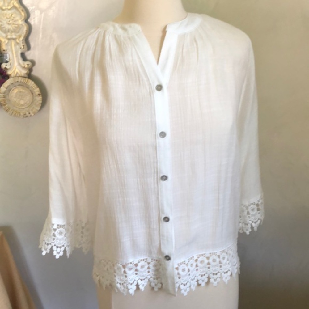 Classic white blouse with sliver buttons and white lace trim on hem and sleeves